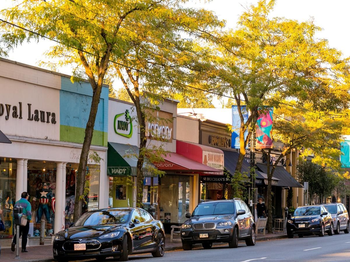 Quaint boutique storefronts along Kerrisdale’s shopping district—historic charm meets modern smart home living
