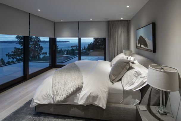 Lutron motorized shades and lighting scenes in West Vancouver smart home